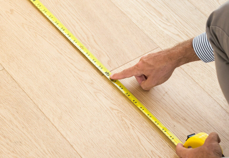 Man measuring floor | Big Bob's Flooring Outlet Yuma